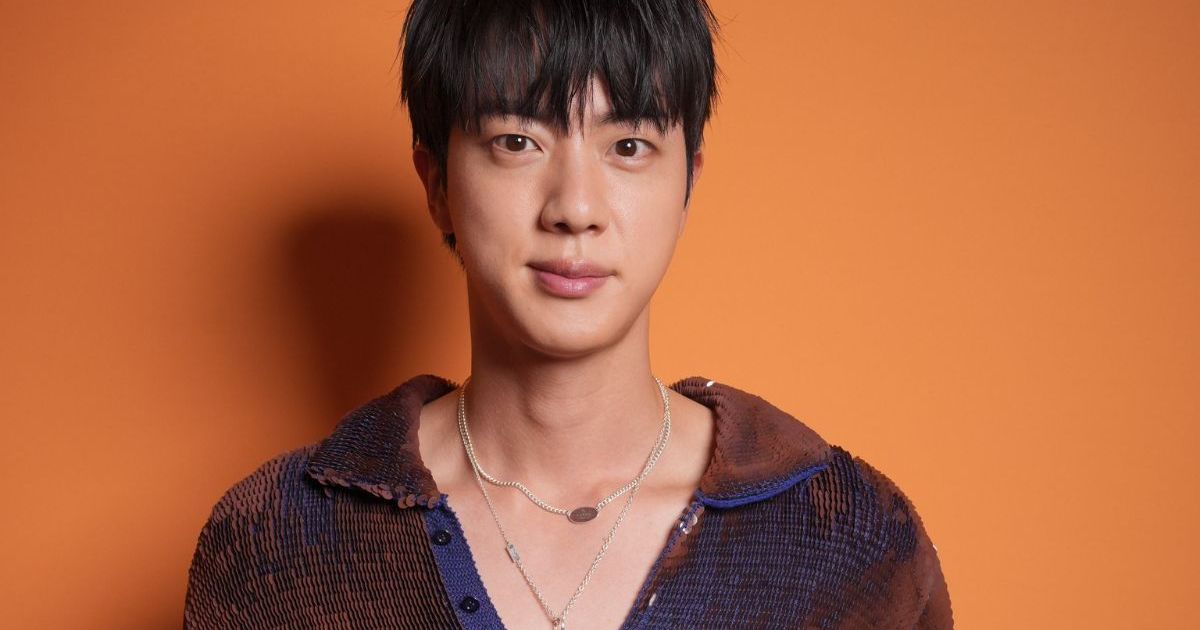 BTS Jin’s Gucci Sweater With a Plunging Neckline Commands Attention